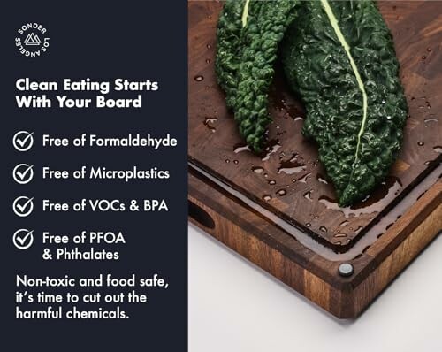 Cutting board with kale, highlighting chemical-free features.