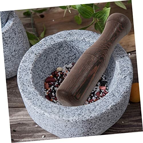 Granite mortar and pestle with mixed spices