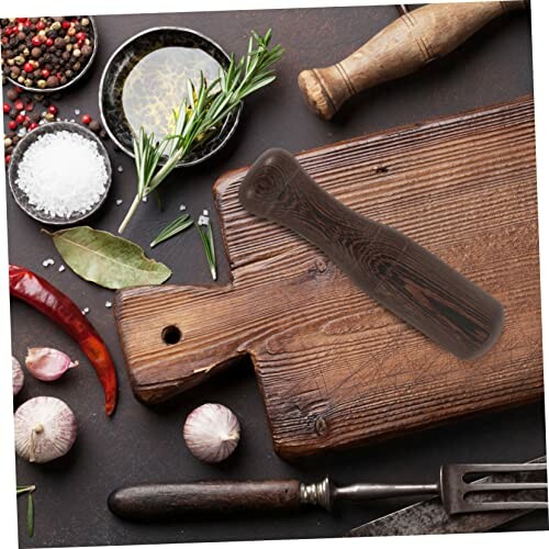 Wooden cutting board with spices and herbs on dark background.