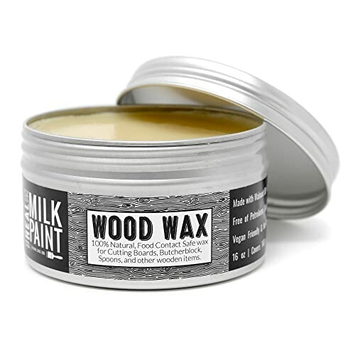 Open tin of wood wax with label