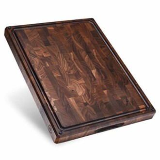 Rectangular wooden cutting board with dark grain pattern