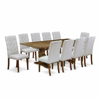 Large wooden dining table with ten white upholstered chairs