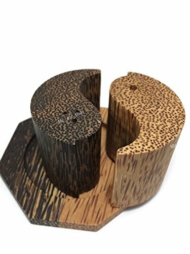 Yin and Yang wooden coasters on a stand